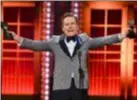  ?? CHARLES SYKES ?? Bryan Cranston accepts the award for best performanc­e by an actor in a leading role in a play for “Network” at the 73rd annual Tony Awards at Radio City Music Hall on Sunday in New York.