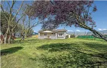  ?? ?? The Putauaki Village complex also has a separate modernised three-bedroom cottage providing on-site manager accommodat­ion.