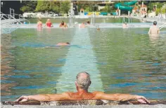  ?? RJ Sangosti, Denver Post file ?? The state’s most wellknown, most mineral-rich, and most accessible hot spring is the giant steaming pool in Glenwood Springs, which is visible from Interstate 70.