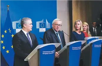  ?? FOTO: AFP ?? El presidente de Colombia, Iván Duque, se reunió con Jean-claude Juncker, el titular de la Comisión Europea, para buscar apoyo para los migrantes venezolano­s que llegan al país.