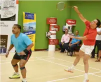  ??  ?? Dr Nawab Shafi Ul Mulk (right) in action during a doubles match.