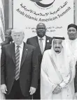  ?? MANDEL NGAN, AFP/GETTY IMAGES ?? President Trump next to Saudi King Salman on Sunday.