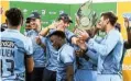  ?? Picture: Gallo Images ?? Titans players celebrate after being crowned the CSA T20 Challenge as they beat Dolphins.
