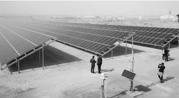  ??  ?? A general view shows part of a new solar plant at the Zaatari refugee camp. — AFP photo