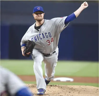  ?? | GETTY IMAGES ?? Cubs left- hander Jon Lester allowed one earned run on five hits while striking out eight in six- plus innings Monday.