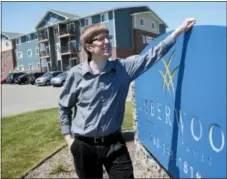  ?? JIM MONE — THE ASSOCIATED PRESS ?? In this photo, Mike Kaeding poses for a photo at one of his company’s apartment complexes in Blaine, Minn. Kaeding is the president of Norhart in Forest Lake, Minn.