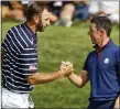  ?? ASSOCIATED PRESS FILE PHOTO ?? Dustin Johnson left, and Rory McIlroy headline a charity match for COVID-19 relief today that will mark the first live golf on television since the pandemic shut down sports worldwide.