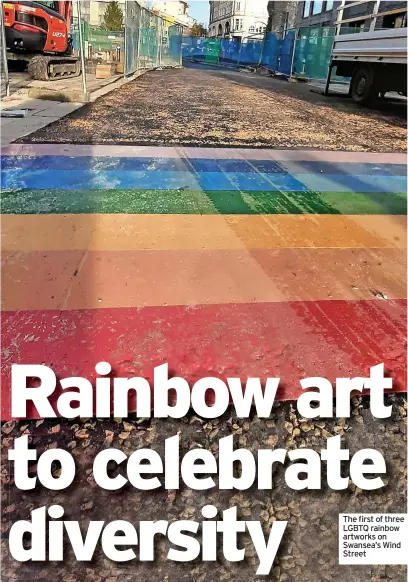  ?? ?? The first of three LGBTQ rainbow artworks on Swansea’s Wind Street