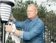  ?? Alex Schuldtz/The Holmes Group ?? Mike Holmes encourages homeowners to consider using exterior solar lighting to help cut down energy costs.