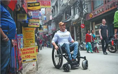  ?? PRAKASH MATHEMA / AGENCE FRANCE-PRESSE ?? Scott Doolan, pictured in Kathmandu, Nepal, on Thursday, will attempt to climb Qomolangma, the world’s highest mountain, by hand.