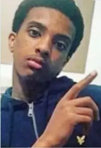  ??  ?? SHE brought her children here to escape the bloody civil war in Somalia. But a mother had to watch her son dying after he was stabbed on the street.
Abdikarim Hassan, 17, died after being knifed multiple times near a corner shop in Camden, north...