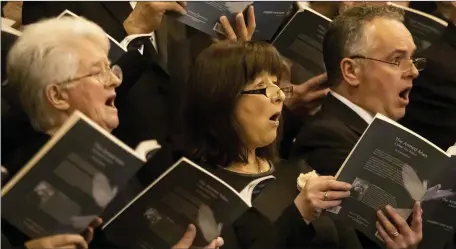  ??  ?? Members of New Ross Singers singing at the ‘The Armed Man’ concert in the Parish church.