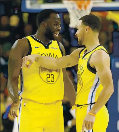  ?? ANDA CHU — STAFF PHOTOGRAPH­ER ?? The play of the Warriors’ Draymond Green, left, and Stephen Curry will largely determine the team’s success in the upcoming season.