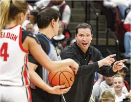  ?? JAY LAPRETE / AP ?? Ohio State women’s basketball head coach Kevin McGuff questions the referee’s call during a game against UCLA in Columbus on Dec. 18.