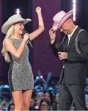  ?? JAY JANNER/AMERICAN-STATESMAN STAFF ARCHIVE ?? Kelsea Ballerina and Kane Brown host the CMT Awards at the Moody Center in 2023 in Austin.