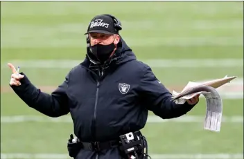  ?? RON SCHWANE
AP PHOTO/ ?? Las Vegas Raiders head coach Jon Gruden reacts during the second half of an NFL football game against the Cleveland Browns, Sunday, in Cleveland.