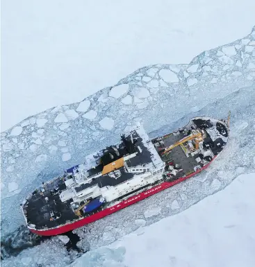  ?? U. S. COAST GUARD / THE ASSOCIATED PRESS FILES ?? The icebreaker Mackinaw maintains a shipping lane on the St. Marys River linking Lakes Superior and Huron. Ottawa is accepting bids for the provision of icebreakin­g services to the Great Lakes and the St. Lawrence Seaway.
