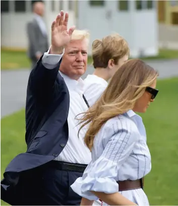  ?? PHOTO AFP ?? Donald, Melania et Barron Trump passaient pour la première fois un week-end en famille à Camp David, résidence de villégiatu­re officielle des présidents des États-Unis.