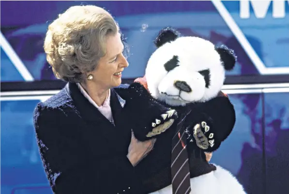  ??  ?? Margaret Thatcher may have thought pandas were not ‘happy omens’, but after posing with this stuffed example while campaignin­g for re-election in 1987, she won the last of her three successive electoral victories