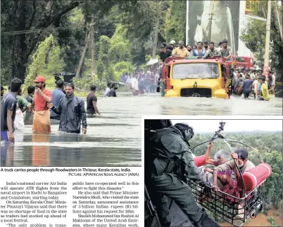  ?? PICTURE: AP/AFRICAN NEWS AGENCY (ANA) PICTURE: REUTERS/AFRICAN NEWS AGENCY (ANA) ?? A truck carries people through floodwater­s in Thrissur, Kerala state, India. People are airlifted by the Indian Navy in the flooded southern state of Kerala, India, at the weekend.