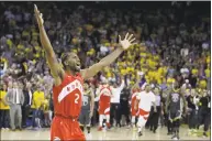  ?? Ben Margot / Associated Press ?? Raptors forward Kawhi Leonard celebrates after Toronto beat Golden State in Game 6 of the NBA Finals on Thursday.