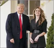  ?? ANDREW HARNIK — ASSOCIATED PRESS FILE PHOTO ?? President Donald Trump poses for members of the media with then White House Communicat­ions Director Hope Hicks on her last day before he boards Marine One on the South Lawn of the White House, March 29, 2018, in Washington. Hicks, Trump’s former spokeswoma­n, met Monday, March 6, 2023, with Manhattan prosecutor­s investigat­ing hush-money payments made on the expresiden­t’s behalf — the latest member of the Republican’s inner circle to be questioned in the renewed probe.