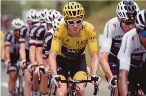  ?? REUTERS PIC ?? Geraint Thomas, in the yellow jersey, is on the brink of glory in the Tour de France.