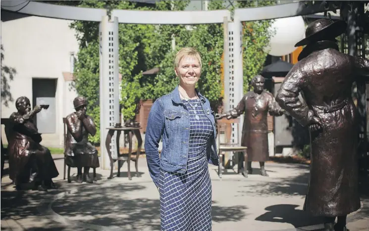  ?? KERIANNE SPROULE ?? Shauna Frederick, chair of the Famous 5 Foundation stands among the Famous Five themselves at the Women are Persons! monument in Calgary’s Olympic Plaza. June 7 marked 100 years since the first two women — Louise McKinney and Roberta MacAdams — were...