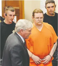  ?? MICHAEL GALLACHER/CANADIAN PRESS FILES ?? Convicted murderer Ronald Smith is escorted to a court date in Deer Lodge, Mont., in 2012.