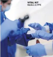  ?? ?? VITAL KIT Medics in PPE