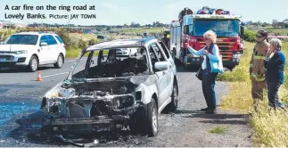  ?? Picture: JAY TOWN ?? A car fire on the ring road at Lovely Banks.