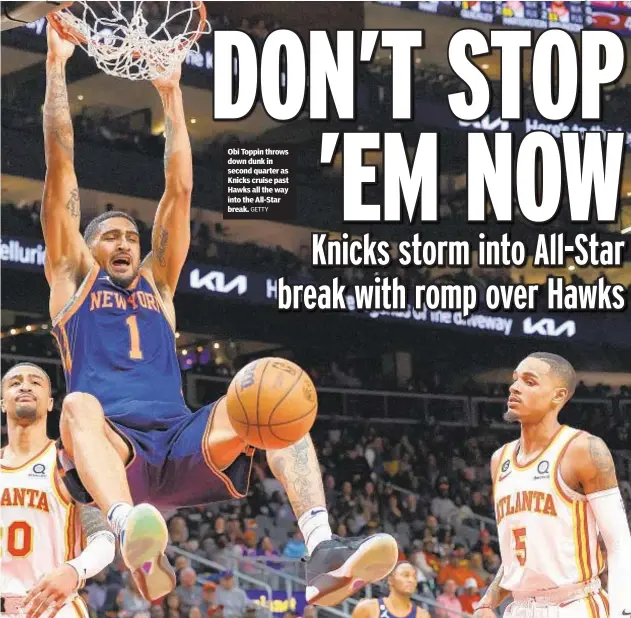  ?? GETTY ?? Obi Toppin throws down dunk in second quarter as Knicks cruise past Hawks all the way into the All-Star break.