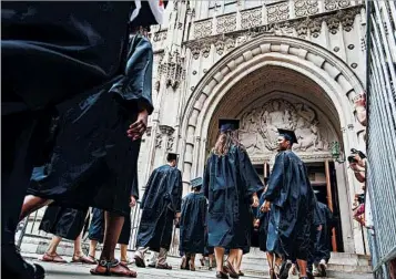  ?? MICHAEL NAGLE/BLOOMBERG NEWS ?? One university official said college rankings have “public significan­ce.” Their proliferat­ion could shake up higher education.