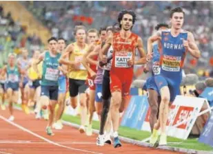  ?? // AFP ?? Mo Katir, tras Jakob Ingebrigts­en, en la final de los 5.000 metros