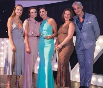  ??  ?? Nicola Hayden of Oceo, (second left) and Marion Hayden, Spa manager, (centre), receive their award from Daniella Moyles and TV presenter Baz Ashmawy.