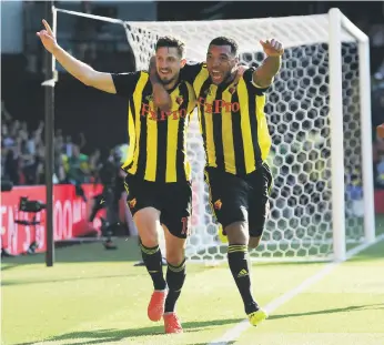  ?? Getty ?? Troy Deeney, right, has made an impressive start to the season for Watford while Craig Cathcart, left, takes on his old club Manchester United at Vicarage Road on Saturday