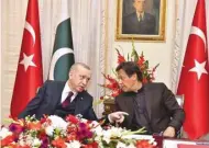  ??  ?? In this handout picture released by the Prime Minister’s Office (PMO) yesterday, Erdogan is seen with Prime Minister Khan during an agreement signing ceremony in Islamabad.