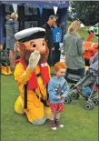  ?? 01_B31emerg02 ?? Sam Fleming of East Kilbride is photograph­ed with Stormy Stan, the RNLI mascot.