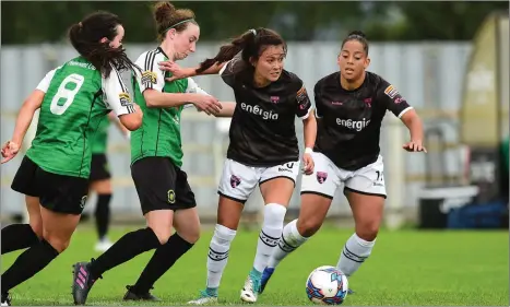  ??  ?? McKenna Davidson of Wexford Youths is tracked by Peamount United duo Karen Duggan and Niamh Farrelly.