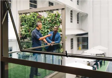  ??  ?? Above: Pod Structures Co-founder and COO Lee Kay Lian (left) with Co-founder and CEO Samuel Vedanaigam (right), photograph­ed during a conversati­on at the second floor roof garden of the Monomer House 1 prototype by A D Lab. Opposite: Founders of A D Lab Warren Liu (left) and Darlene Smyth (centre) with Associate Partner at ADDP Architects Tang Kok Thye (right) beside the Monomer House 1 prototype at the National Design Centre.