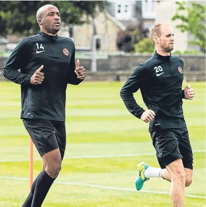  ?? SNS Group. Picture: ?? Frank van der Struijk, right, with fellow new signing William Edjenguele.