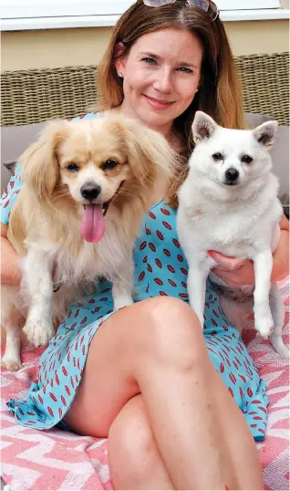  ??  ?? My family: Pip Tomson with her beloved South Korean pets Robin and Bindi