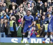  ??  ?? Chelsea’s John Terry reacts after scoring the game’s only goal against Everton in the English Premier League on Saturday.