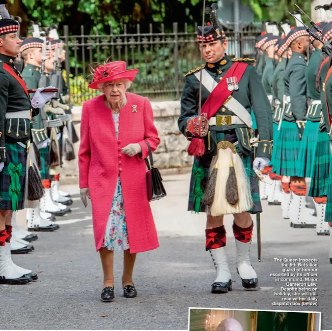  ??  ?? The Queen inspects the 5th Battalion guard of honour escorted by its officer in command, Major Cameron Law. Despite being on holiday, she will still receive her daily dispatch box (below)