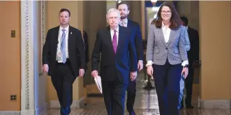 ?? (Erin Scott/Reuters) ?? SENATE MAJORITY LEADER Mitch McConnell walks to the Senate chamber yesterday.