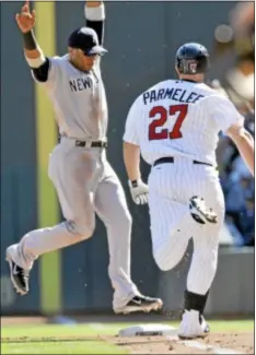  ?? AP Photo ?? Yankees second baseman Robinson Cano forces out Minnesota’s Chris Parmelee at first base during the Bombers’ win on Wednesday.