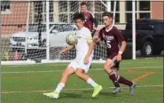  ?? AUSTIN HERTZOG - MEDIANEWS GROUP ?? Spring-Ford’s Colin Trainor looks to possess the ball as Pottsgrove’s Justin Collings defends.