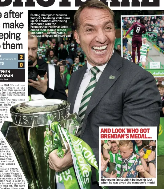  ??  ?? Feeling champion: Brendan Rodgers’ beaming smile sums up his emotions after being presented with the Premiershi­p trophy as Celtic ended their league season unbeaten — a remarkable feat last achieved 118 years ago