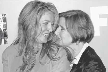  ?? STUART RAMSON/AP ?? Joely Fisher, left, with Carrie Fisher in 2007, opens up about her life in “the Fishbowl.”