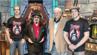  ??  ?? Zay Smith enjoyed an opportunit­y to take his sons Bryant (far left) and Zachary to meet TV’s Svengoolie.